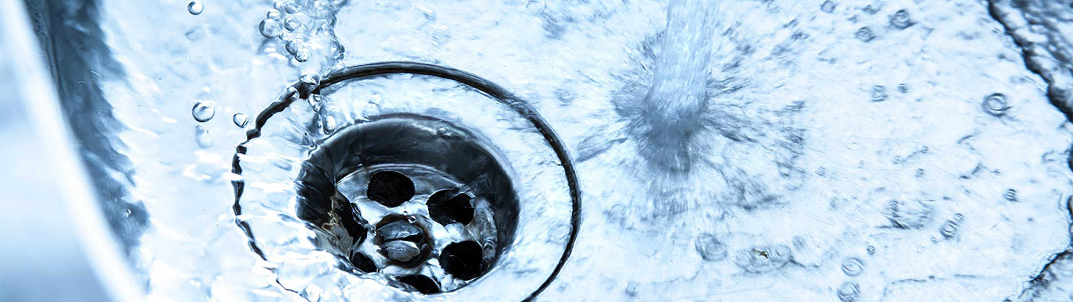 image of water pouring down from tap