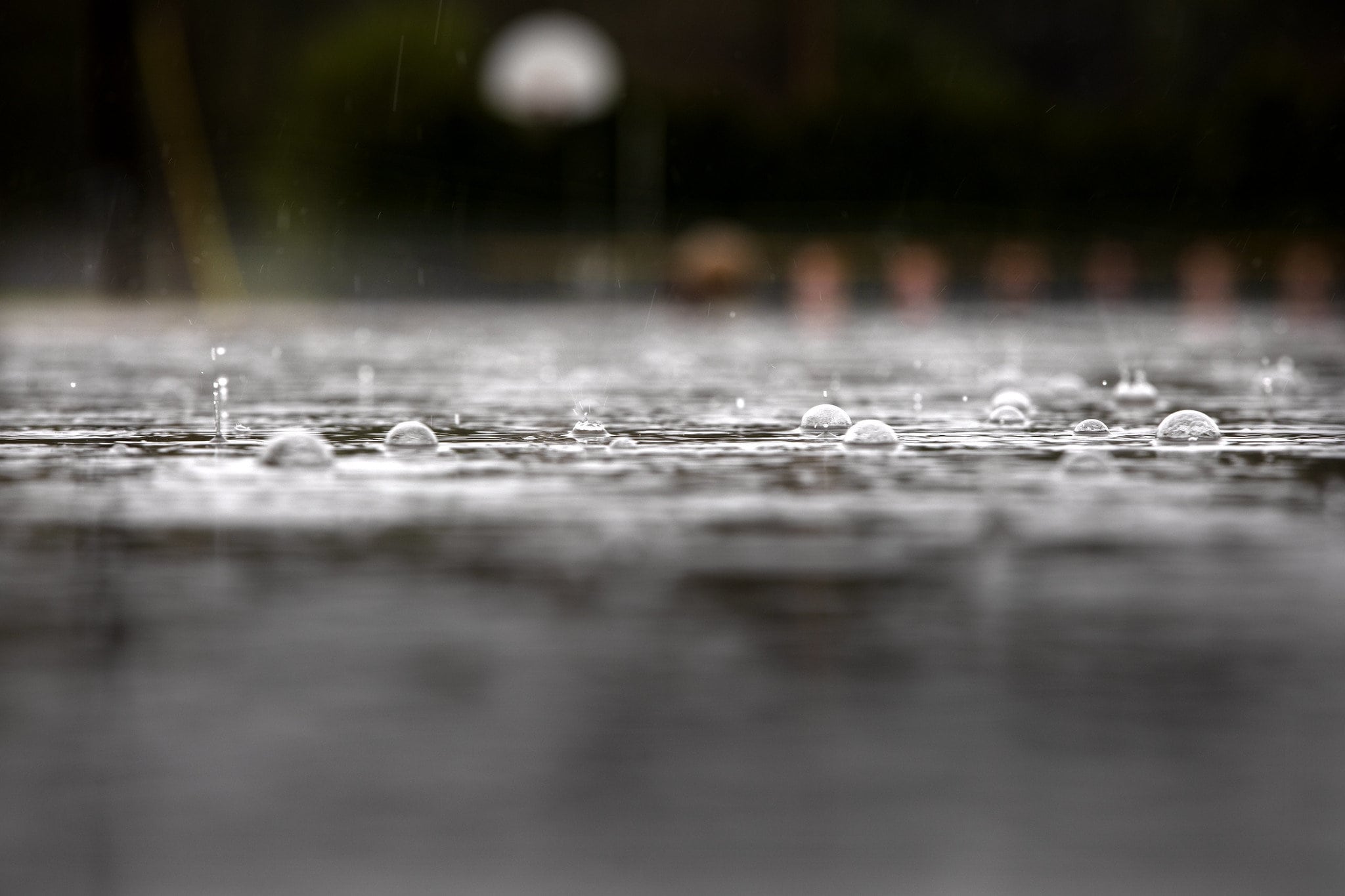 Rain drops on concrete